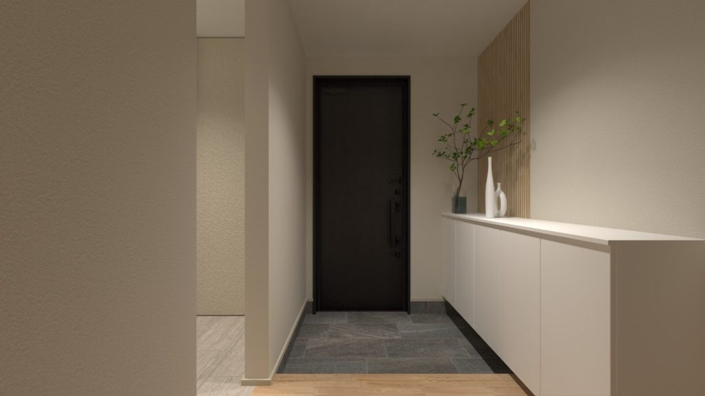 玄関にはウッドパネルのアクセント